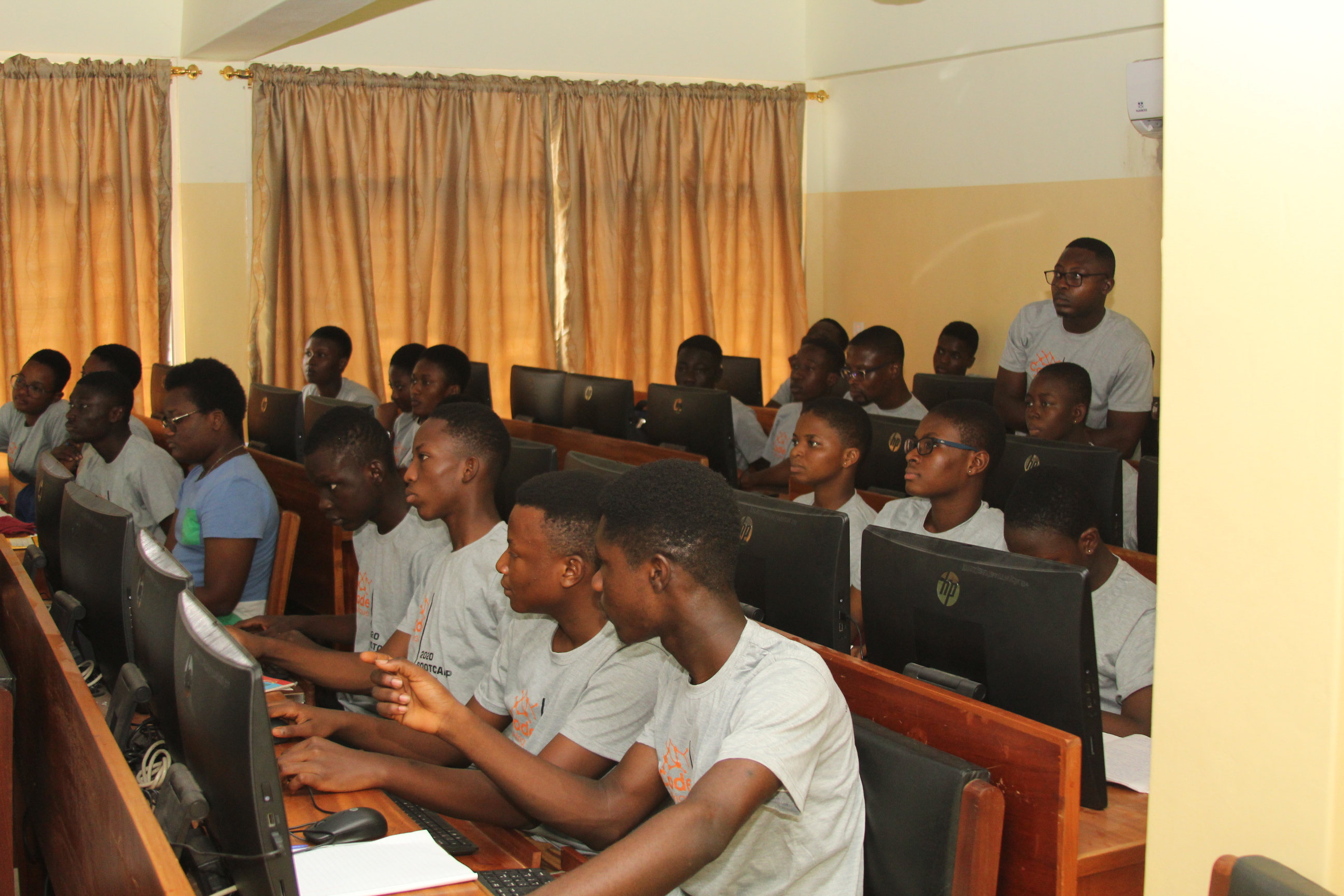 Students collaborating on AI projects